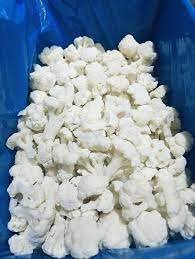 A large blue bag inside an insulated box, filled with IQF frozen cauliflower.