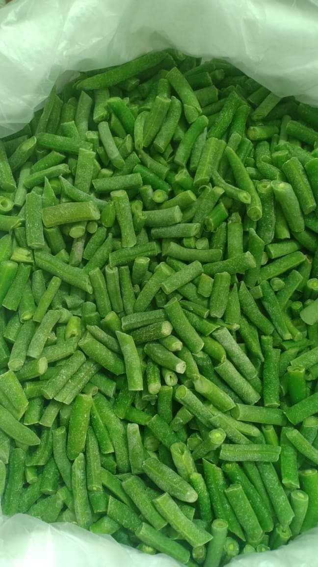 A bag of frozen green beans ready for packing.